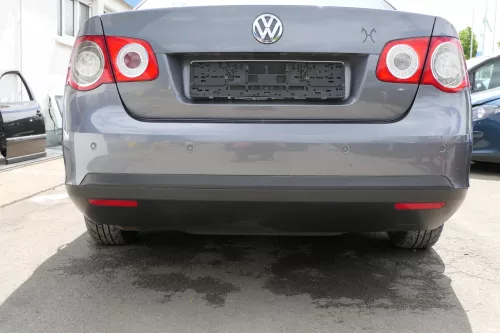 VW Jetta 1K Stoßstange hinten Heckstoßstange Stoßfänger grau LD7X platinumgr PDC (128696)