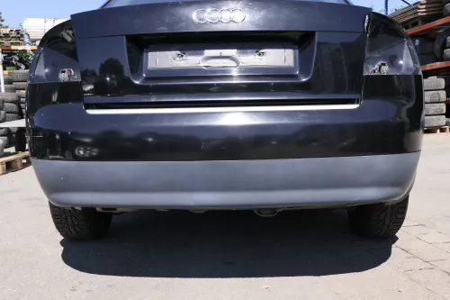 Audi A4 8E B6 Limousine Stoßstange hinten mit Spoiler schwarz LY9B PDC