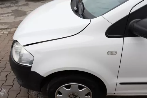 VW Fox Kotflügel vorne links weiß LB9A - Delle