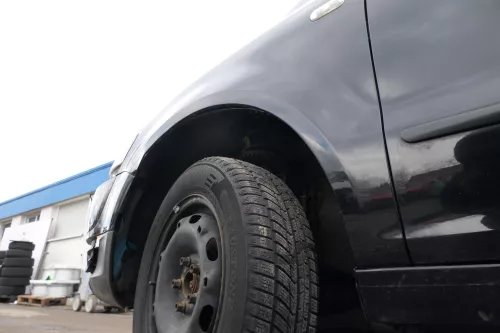 VW Fox Kotflügel vorne links schwarz L041 - DELLE (166448)