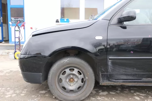 VW Lupo 6X Kotflügel vorne links schwarz L041