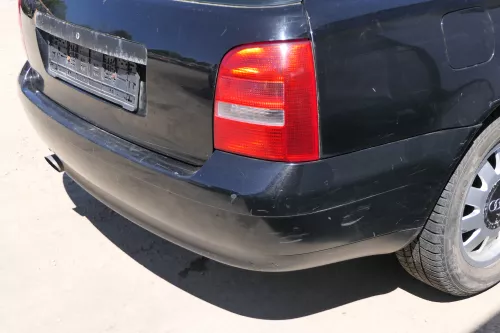 Audi A4 B5 Limousine Limo Stoßstange hinten Heckstoßstange schwarz LY9B Facelift (175441)