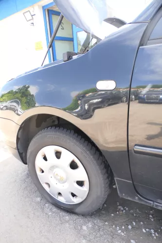 VW Lupo Kotflügel vorne links schwarz L041 vorn - eine kleine Delle (175806)