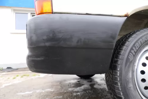 VW T4 Caravelle Multivan Stoßstange Heckstoßstange hinten 701807417 schwarz (177136)