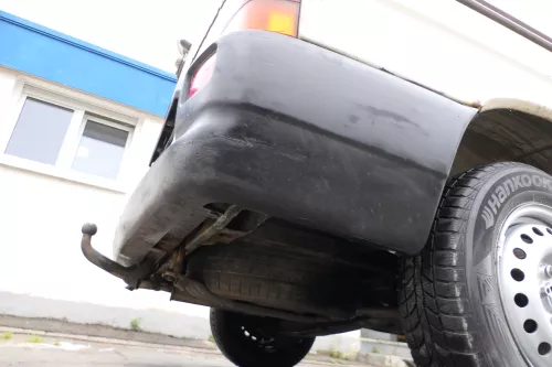 VW T4 Caravelle Multivan Stoßstange Heckstoßstange hinten 701807417 schwarz (177136)