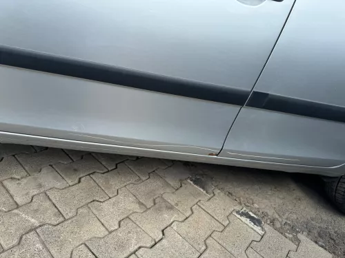 Fabia 5J Kombi + Limo Tür vorne links Fahrertür - silber LA7W -ohne Anbauteile (180760)