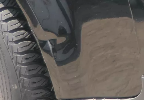 Audi A4 8E B6 Kotflügel vorne rechts schwarz LY9B - Delle nähe Stoßstange unten (181511)