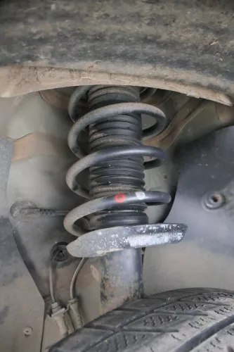 1x VW Eos Golf 5 V Touran Stoßdämpfer Federbein Feder 1T0413031HE vorn